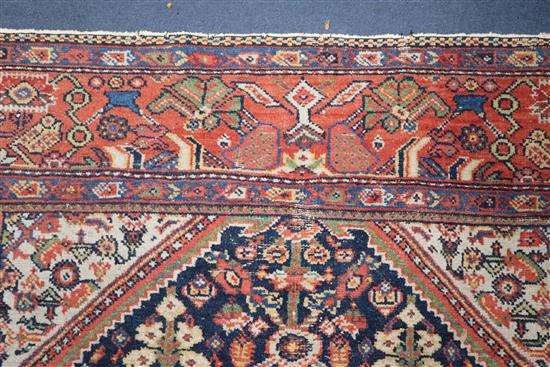 A Caucasian blue ground rug 200 x 138cm